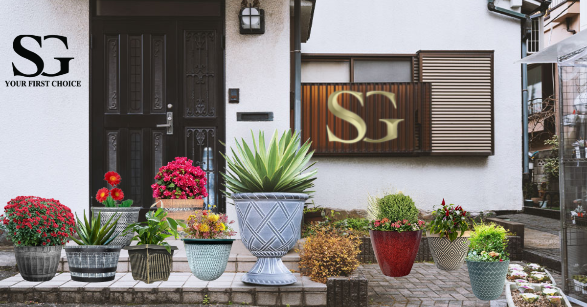 Front entrance of house with black door and various colorful potted plants arranged outside